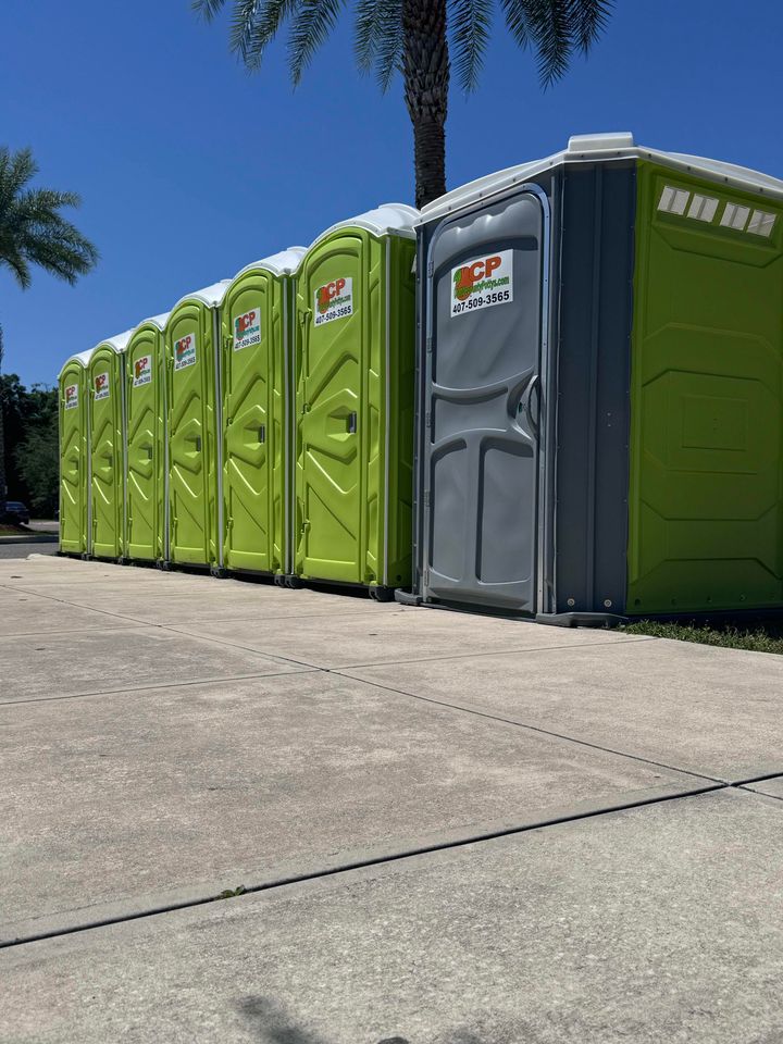 Row of Orange County Pottys Portable Toilets